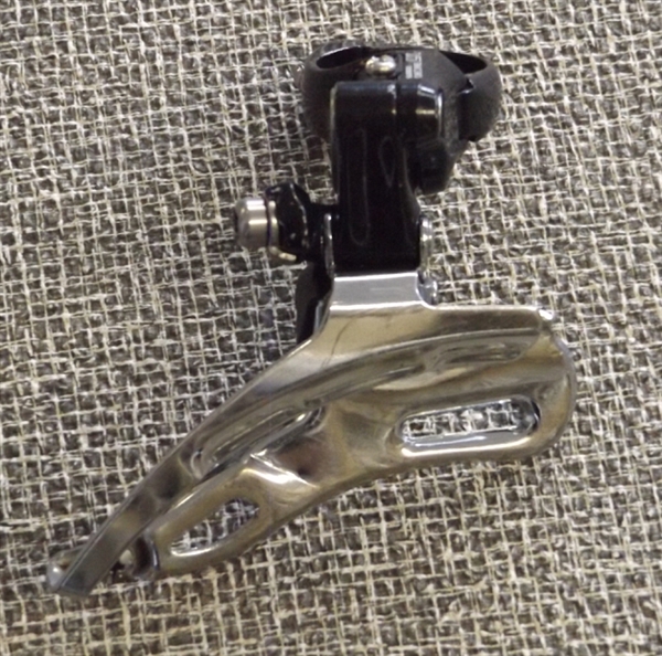 8 speed Shimano FD-M566 triple front derailleur 34.9 top pull